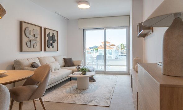 Obra nueva - Apartamento -
Playa Flamenca