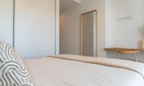 Obra nueva - Apartamento -
Playa Flamenca